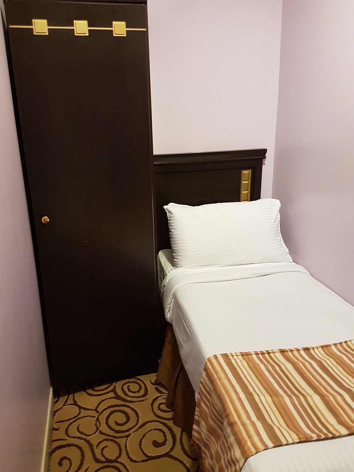 Taiba Suites Madinah Medyna Zewnętrze zdjęcie A single bed